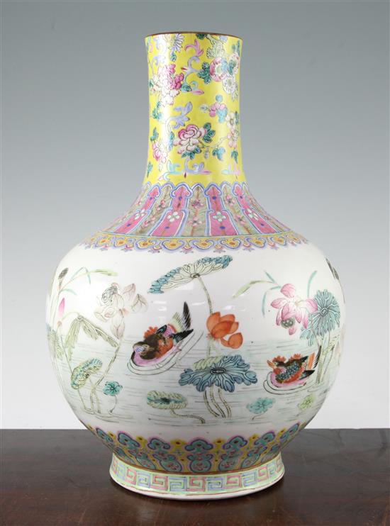 A Chinese famille rose bottle vase, Daoguang seal mark and of the period (1821-50), 36cm, neck reduced, base drilled